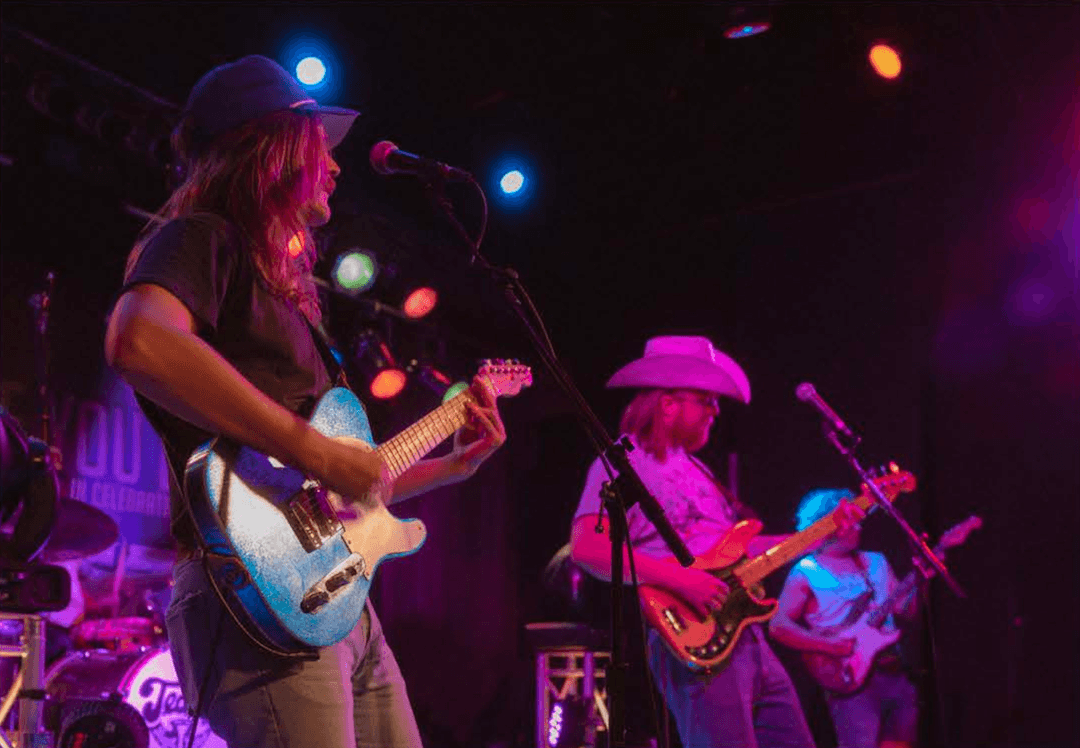 Band playing guitars in Ste. Genevieve