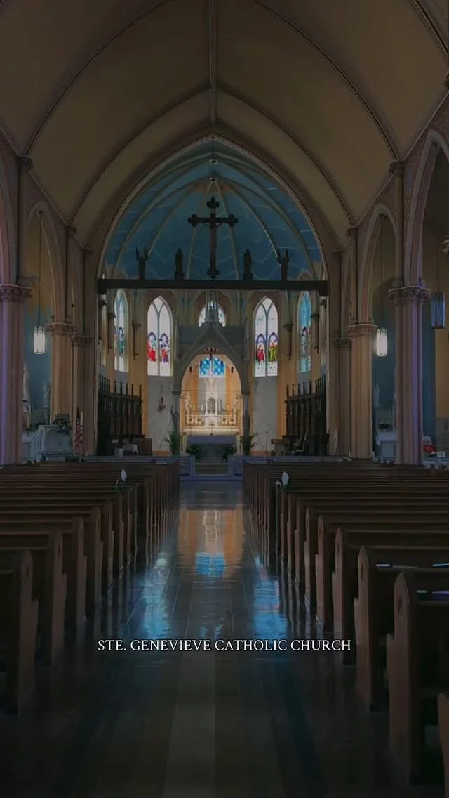 Ste. Genevieve Catholic Church is one of the most enduring landmarks in Missouri’s oldest town, Ste. Genevieve. The parish was founded in 1759 by Jesuit missionaries from Quebec and named for Ste. Genevieve, the patron saint of Paris. The current Gothic Revival church was designed by Fr. Francis Xavier Weiss and built over earlier log and stone churches. Its cornerstone was laid in 1876, and it was consecrated in 1880. For generations, the church has stood through flood, war, and change, occupying the same ground since the 18th century.

According to local tradition, when the current brick church was constructed in the 1870s, it was built around the original wooden church. Once the new structure was complete, the old church was carefully dismantled and its pieces carried out through the front doors. The baptismal bowl used today is believed to be the same one from the mid-1700s, used to baptize generations of parishioners over the centuries.