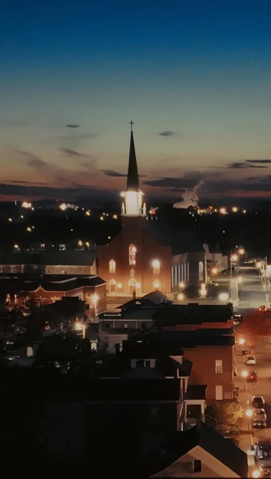 Look at the view!  And watch the town sparkle like rhinestones.  Ste. Genevieve’s beauty and feel have been likened to villages in Europe.  That encapsulates the romance you feel driving in, but, nothing quite can describe the feeling you get walking the streets at night.  It’s peaceful.  It’s safe.  It stretches your perspective on what America is all about. 

Here, it’s about preserving the things worth living for.  We’ve kept our downtown alive.  We’ve kept our Catholic faith strong.  We’ve made the streets more walkable.  We’ve continued to find ways to conserve the historic houses that make our story so interesting.